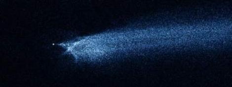 Hubble a surprins coliziunea a doi asteroizi