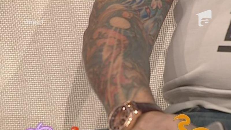 VIDEO! Serghei Mizil si-a etalat tatuajele la 