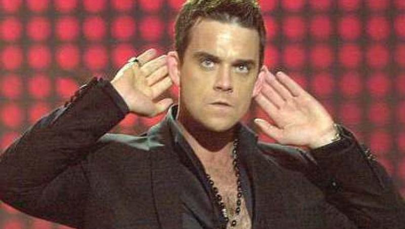 Robbie Williams canta alaturi de Take That, dupa 15 ani
