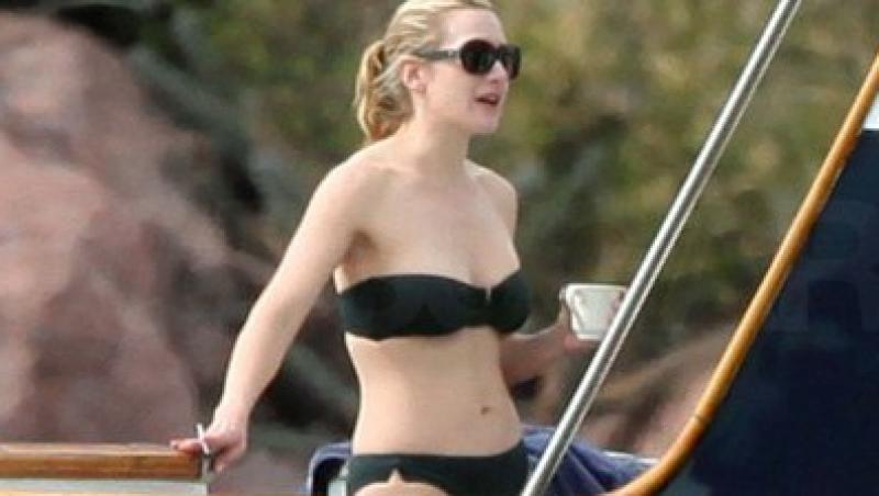 Kate Winslet, singura in costum de baie