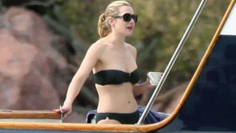 Kate Winslet, singura in costum de baie