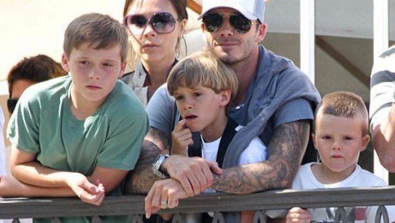David Beckham cu sotia si copii la concert