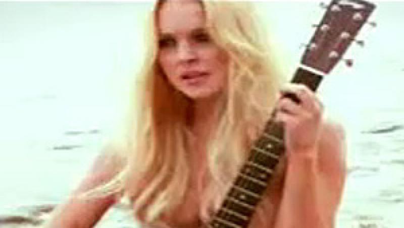 Video: Lindsay Lohan, pictorial sexy intr-o revista pentru barbati