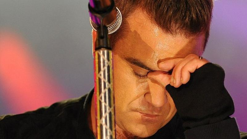 Robbie Williams a uitat versurile melodiei Feel in fata a 60.000 de spectatori
