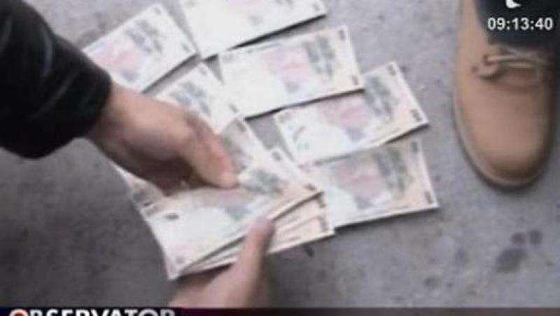 VIDEO! Bucuresti: Falsificatori de bani prinsi in flagrant