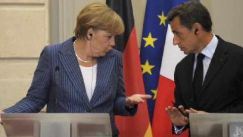 Angela Merkel si Nicolas Sarkozy: Negocierile pentru salvarea Greciei progreseaza