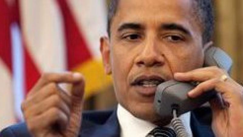 Barack Obama a vorbit cu Angela Merkel la telefon despre criza din zona euro
