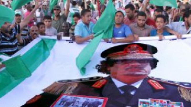 Muammar Gaddafi,  inmormantat intr-un loc secret din desert