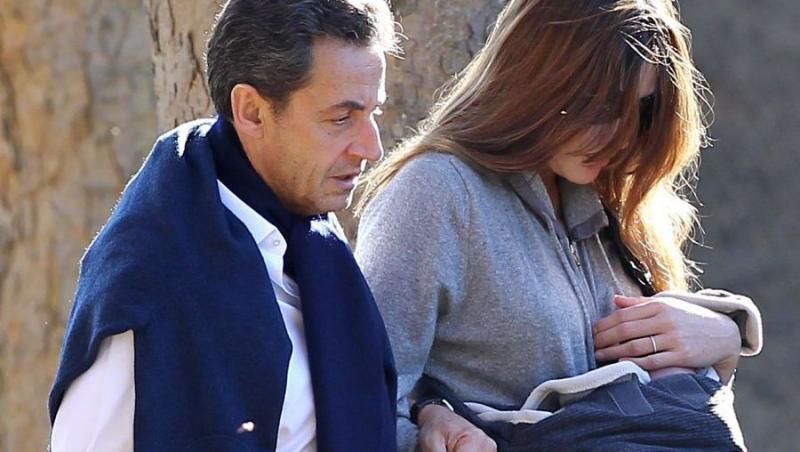 FOTO! Nicolas Sarkozy si Carla Bruni si-au scos fetita in public pentru prima data