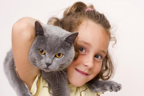 Cinci metode prin care sa iti implici copilul in cresterea animalului de companie