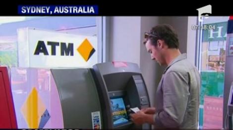 Australia: Bancomatele unei banci au dat din greseala bani in plus