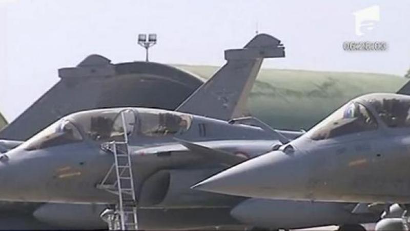 Franta si Marea Britanie cer NATO sa ajute rebelii din Libia