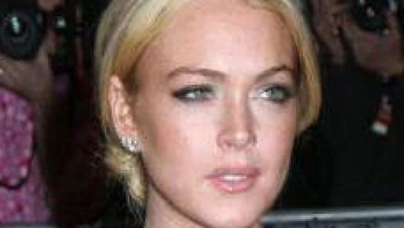 Lindsay Lohan a ajuns dupa gratii