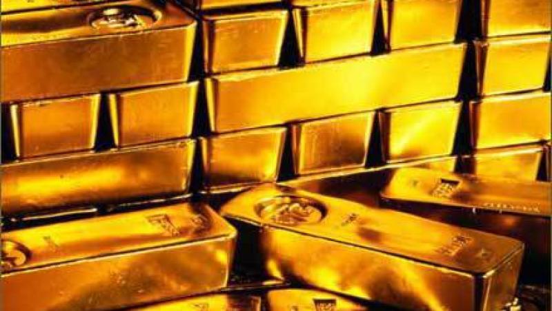 Aurul ar putea ajunge la 2.000 de dolari pe uncie
