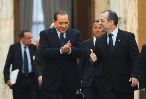 Berlusconi i-a dat lui Oprescu un set de cravate, la o cafea