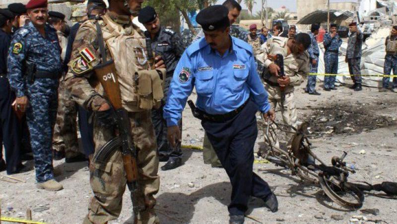 Atac cu bombe si luare de ostatici, la un sediu guvernamental din Irak