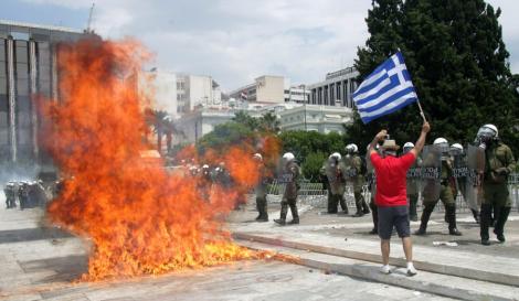 FMI: Criza din Grecia s-ar putea extinde si in Statele Unite