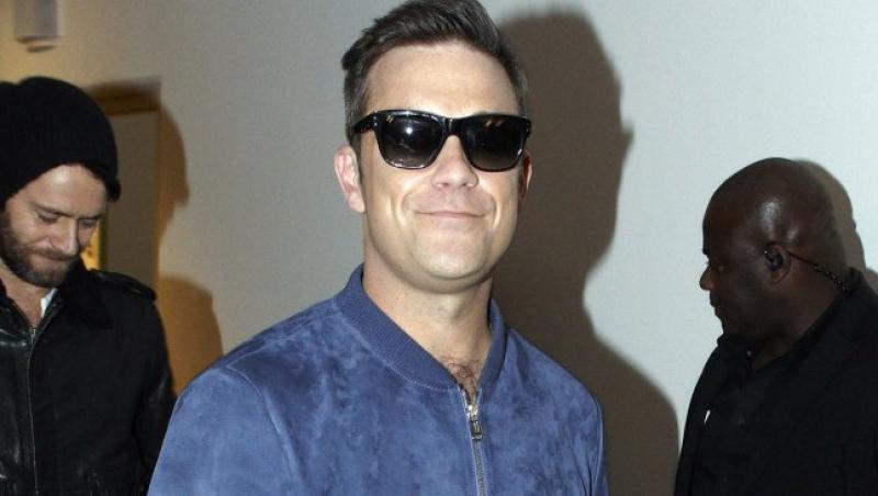 Robbie Williams a facut toxiinfectie alimentara
