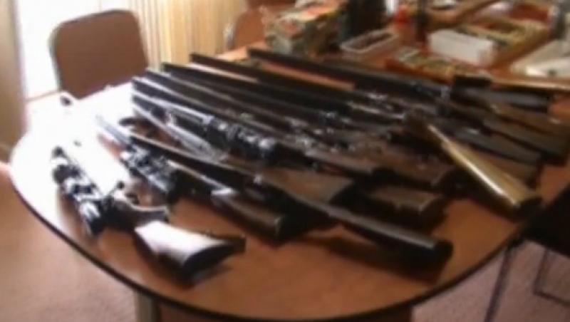 Arsenal de arme si munitie in subsolul unui bloc din Timisoara