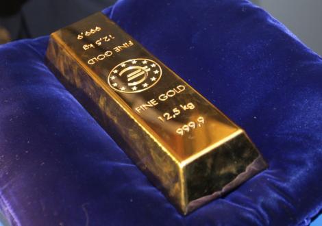 Divergentele din Statele Unite duc pretul aurului la peste 1.620 de dolari pe uncie