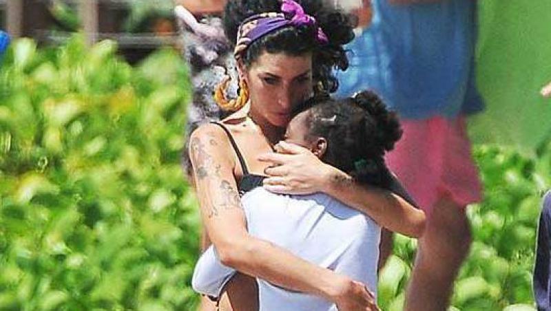 Amy Winehouse urma sa adopte o fetita de 10 ani!