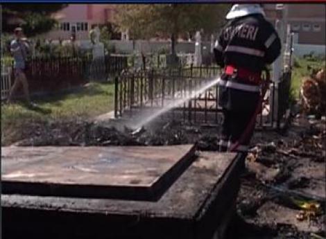 Mormantul omului de afaceri George Naghi, distrus de un incendiu