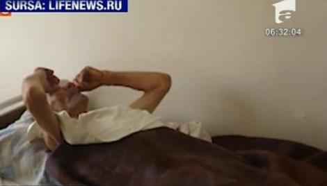 VIDEO! Un pensionar din Rusia, tinut in lanturi de propria fiica