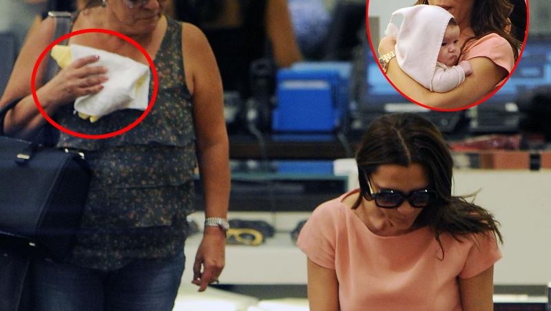 FOTO! Victoria Beckham a imputit aerul de la Prada cu scutecul fetitei