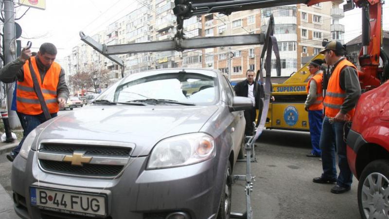 Ridicarea masinilor din Bucuresti, o afacere de peste 160 mil. lei