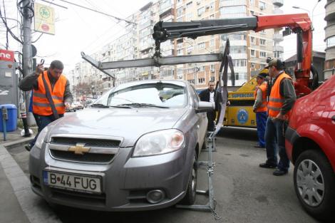 Ridicarea masinilor din Bucuresti, o afacere de peste 160 mil. lei