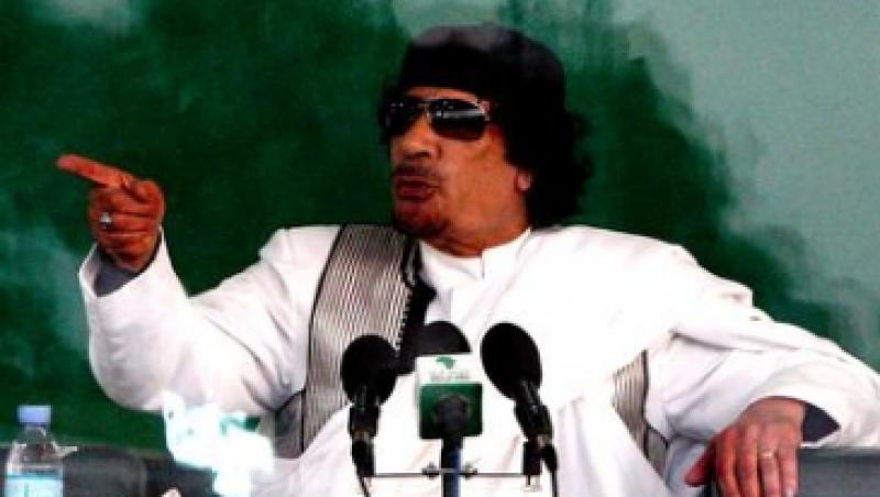 Interpolul cere arestarea lui Muammar Gaddafi, a fiului si a cumnatului acestuia