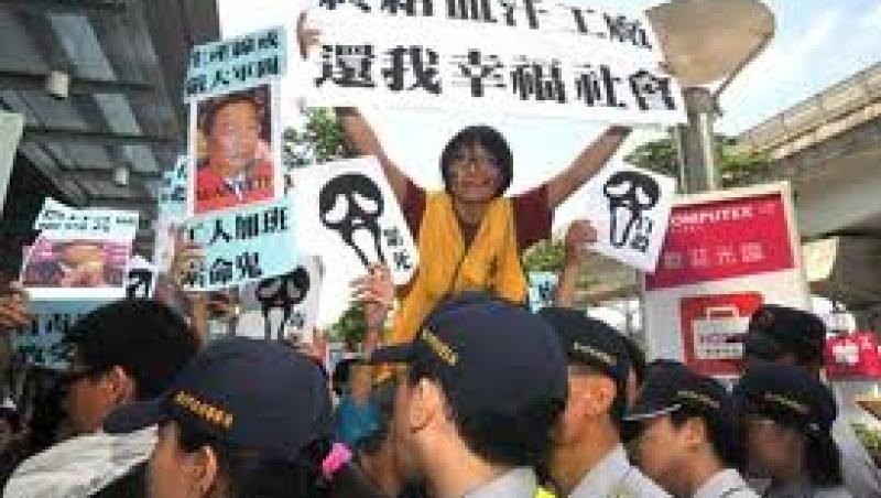 150 de muncitori din China ameninta cu sinuciderea in masa