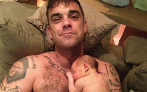 Robbie Williams: "Ador sa fiu tata. Acum, viata e mult mai frumoasa pentru mine"