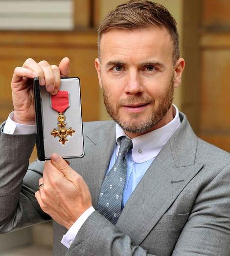 Jurat X Factor la curtea Reginei Angliei: Gary Barlow a devenit Ofiter al Imperiului Britanic