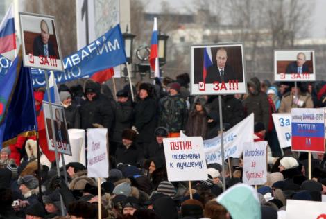 Vladimir Putin, "amendat" cu 25 de euro pentru mitingul simpatizantilor sai