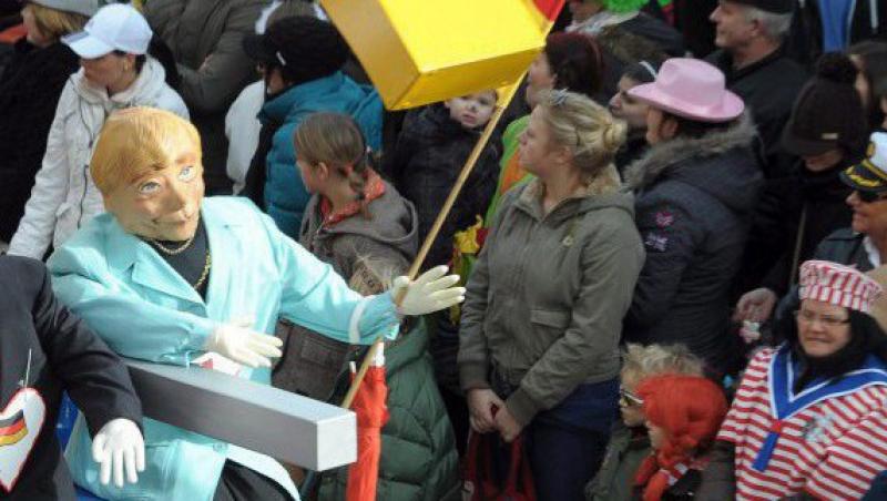 FOTO! Sarkozy si Merkel, personaje de carnaval in Germania