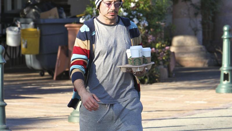 FOTO! Robert Downey Jr., elegant pe covorul rosu, dar neingrijit la jogging