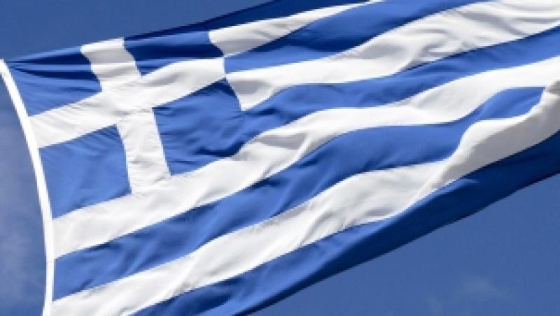 FMI a aprobat un imprumut de 28 miliarde euro pentru Grecia