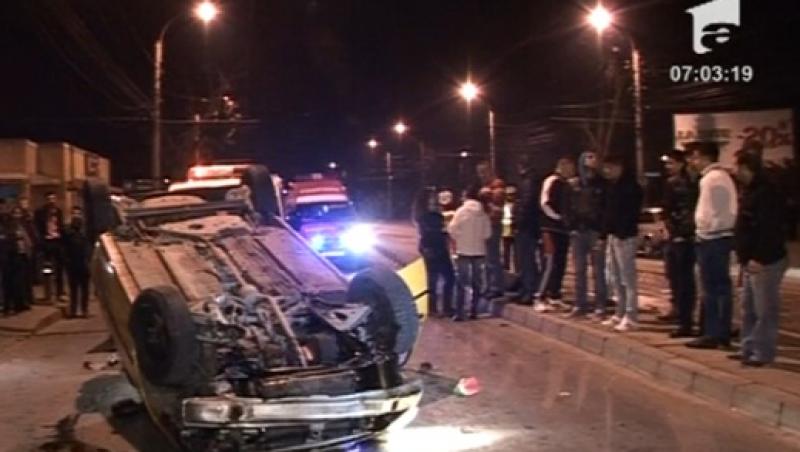 VIDEO! Bucuresti: S-a rasturnat cu taxi-ul pe linia de tramvai