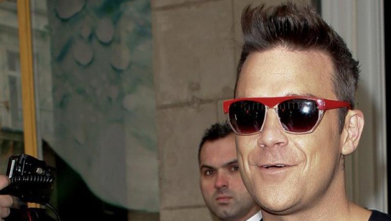 Baiat cuminte: Robbie Williams se lasa de fumat!