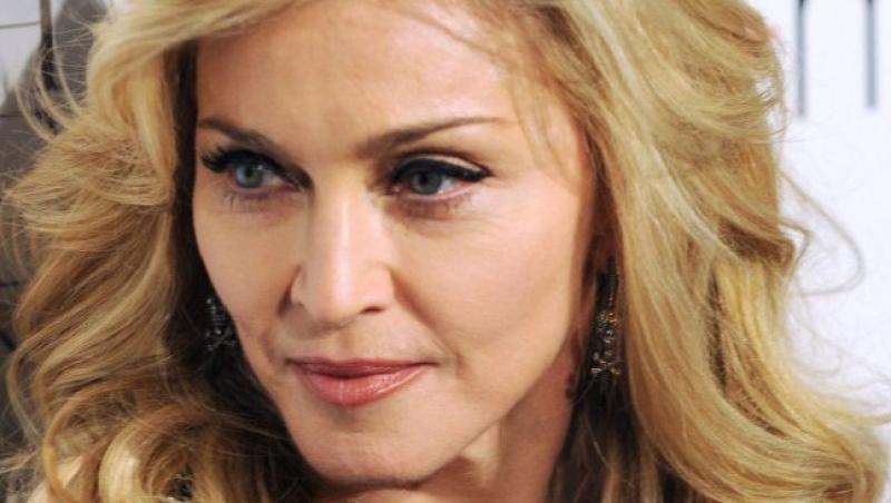 Madonna lanseaza un parfum cu miros de whisky