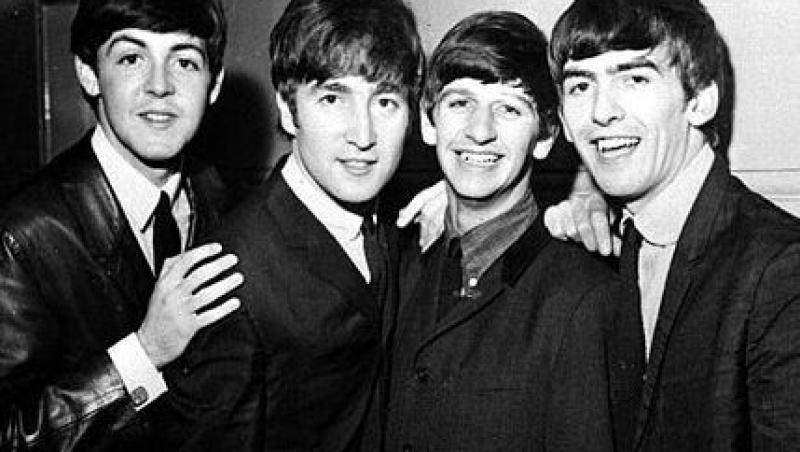 Fotografii inedite cu trupa The Beatles, scoase la licitatie