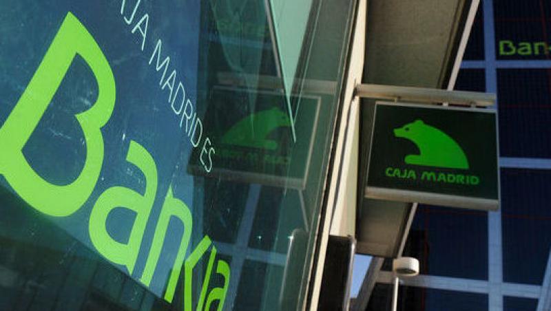 Criza doboara o banca in Spania: Bankia cere un ajutor de 19 miliarde de euro