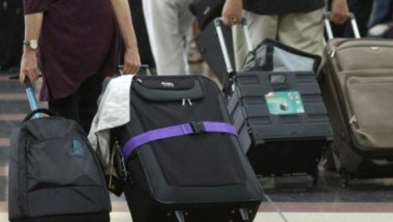 VIDEO! Hotii din bagajele de pe aeroportul Otopeni, prinsi in flagrant