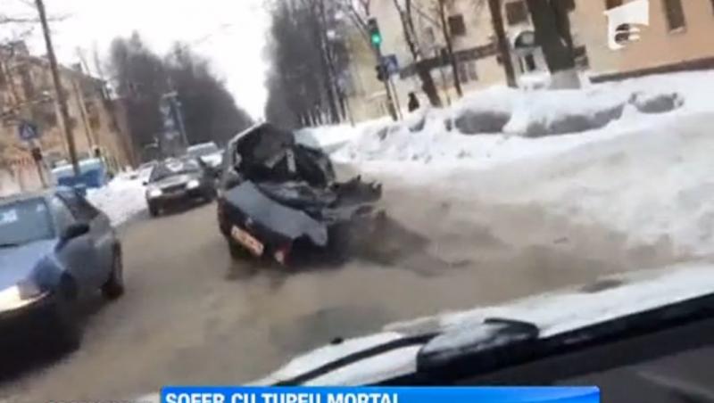 Rusia: A fugit de la locul accidentului cu masina rupta in doua si cu un pasager mort pe bancheta din spate