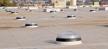 Birourile viitorului: betonul care se curata singur, pereti digitali, fatade vii