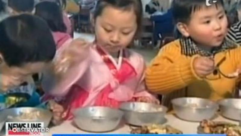 Copiii din Coreea de Nord au primit cate un kilogram de bomboane de ziua lui Kim Jong-un