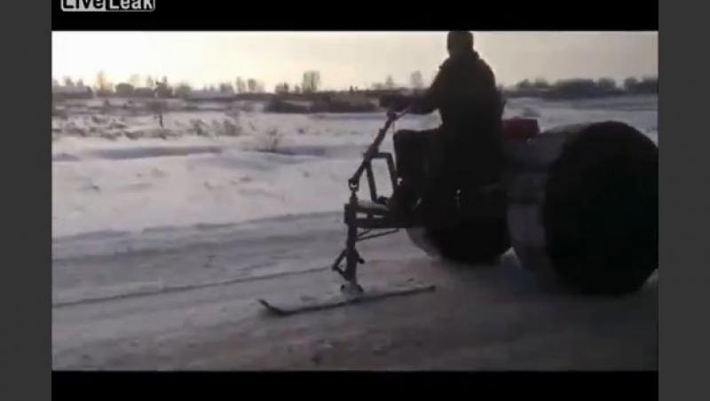 VIDEO! Una noua din Rusia. Cum s-a pregatit un sofer de iarna: si-a tras ATV cu roti de tractor