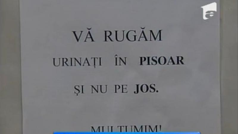 Revolta in Parlament! Femeile de serviciu au recurs la afise care sa ii invete pe alesi cum sa foloseasca... pisoarul