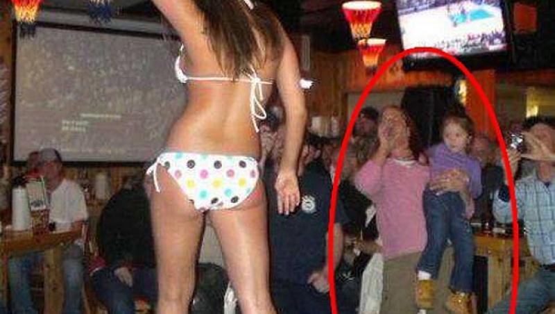 FOTO Parinti iresponsabili: isi duc copiii in cluburi de striptease, ii tin in lesa si le cumpara papusi Hitler